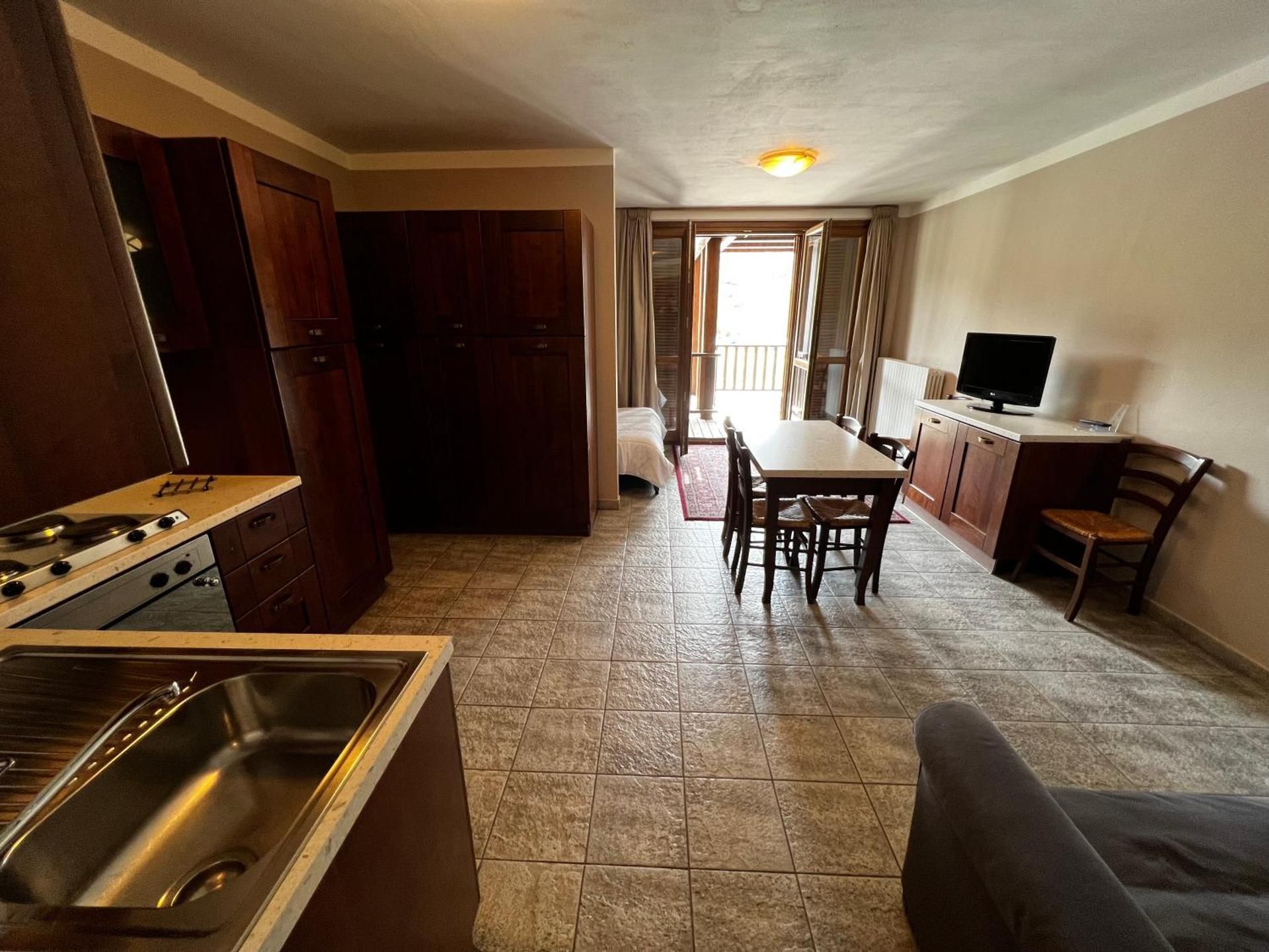 One-Bedroom Apartment with Balcony and Mountain View