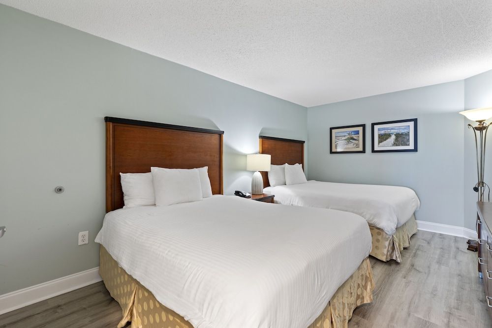 One Bedroom Deluxe Suite- 2 Queen Beds, Oceanfront, Private Balcony, Full Kitchen