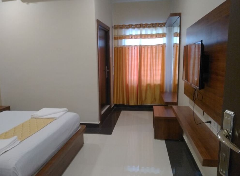 Faiz Residency Deluxe Room 6