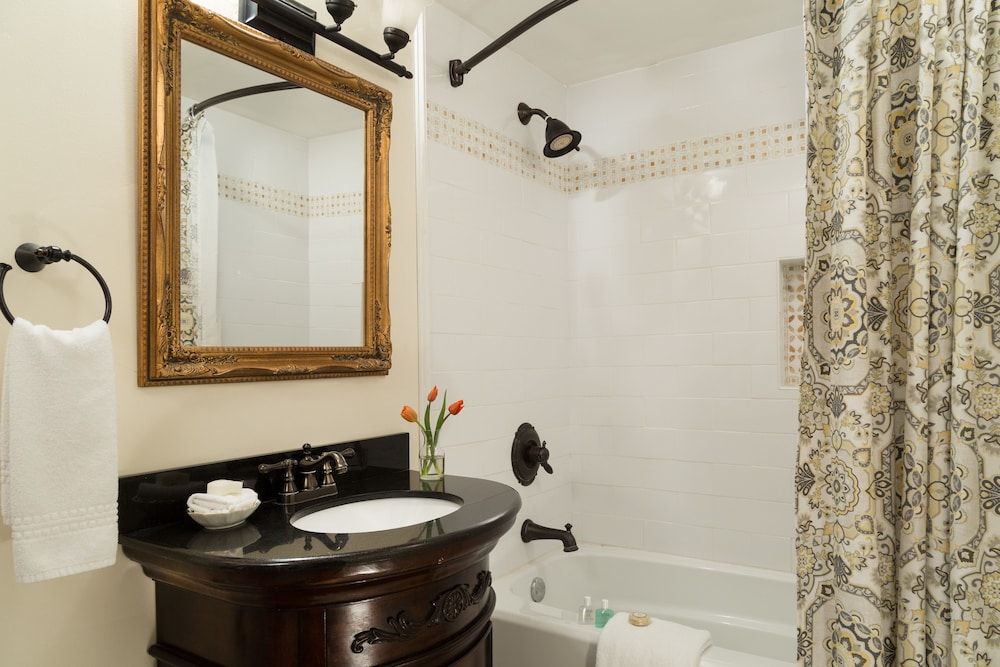 The Four Chimneys Inn Deluxe King Room  with Sitting Area, Private Bathroom,  Porch, RM-11 4