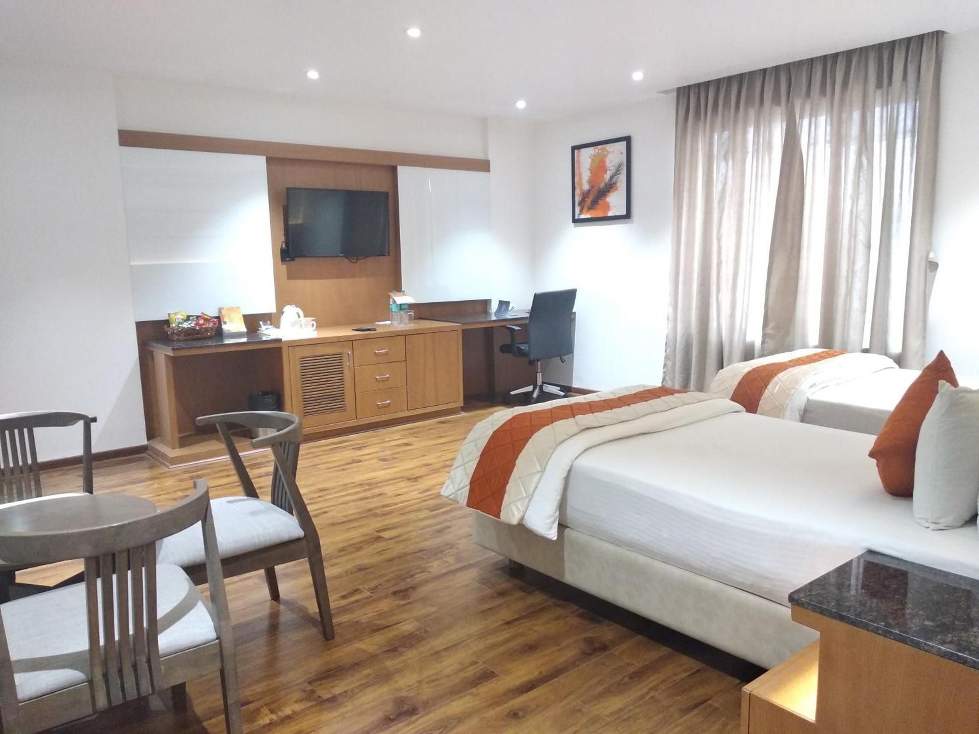 Kyriad Hotel Gulbarga by OTHPL Deluxe Room 4