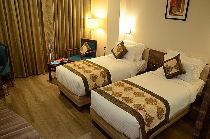 Spree Hotel Jaipur Deluxe Room Twin Bed 2