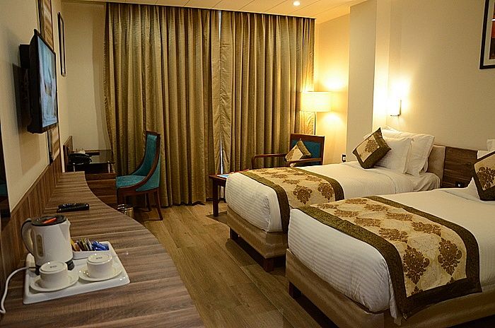 Spree Hotel Jaipur Deluxe Room Twin Bed 3