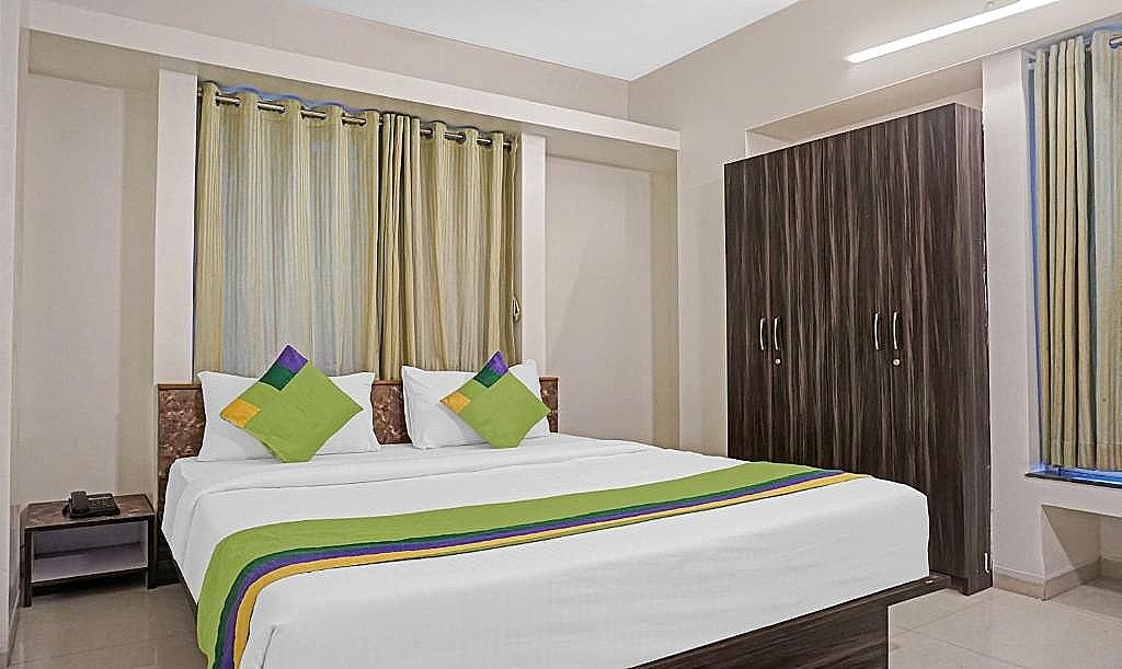 Treebo Diamond Residency - DDPK Inn Economy Room