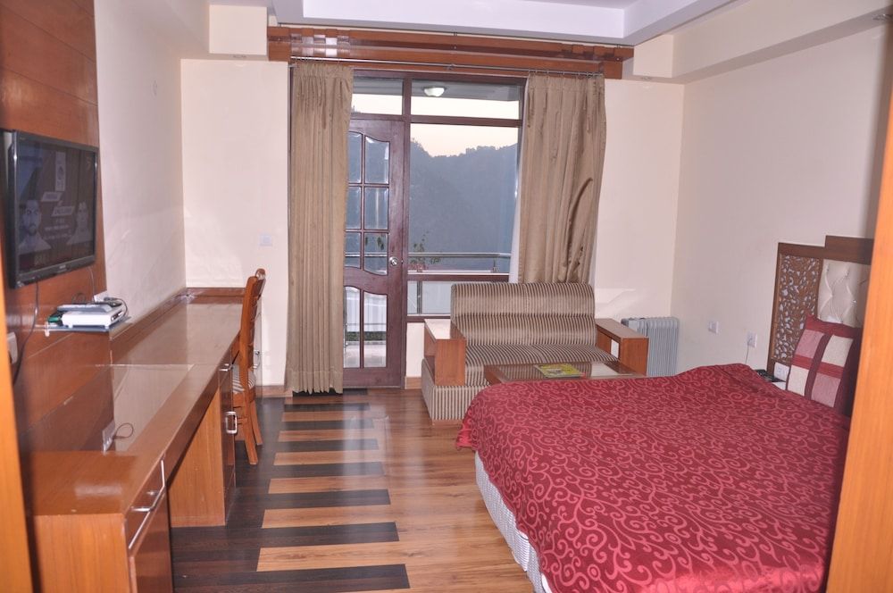 Luxury Room with Balcony (Hot & Cold AC)