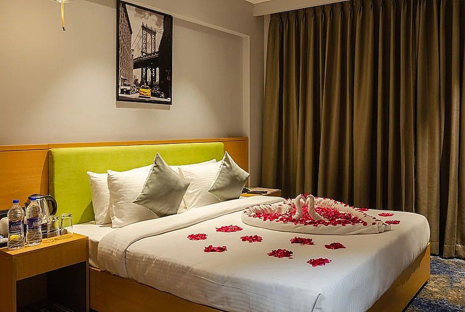 The Amore Surat Super Deluxe Room
