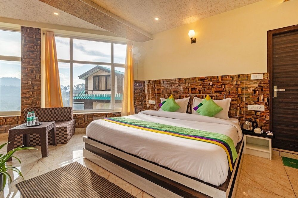 Treebo Srishti Vaikunth With Mountain View Standard Double Room