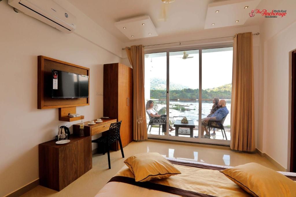 The Anchorage Athirapally Premium Room with Balcony 3