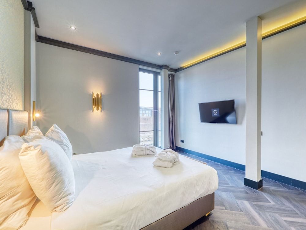 undefined Triple G Hotels 5