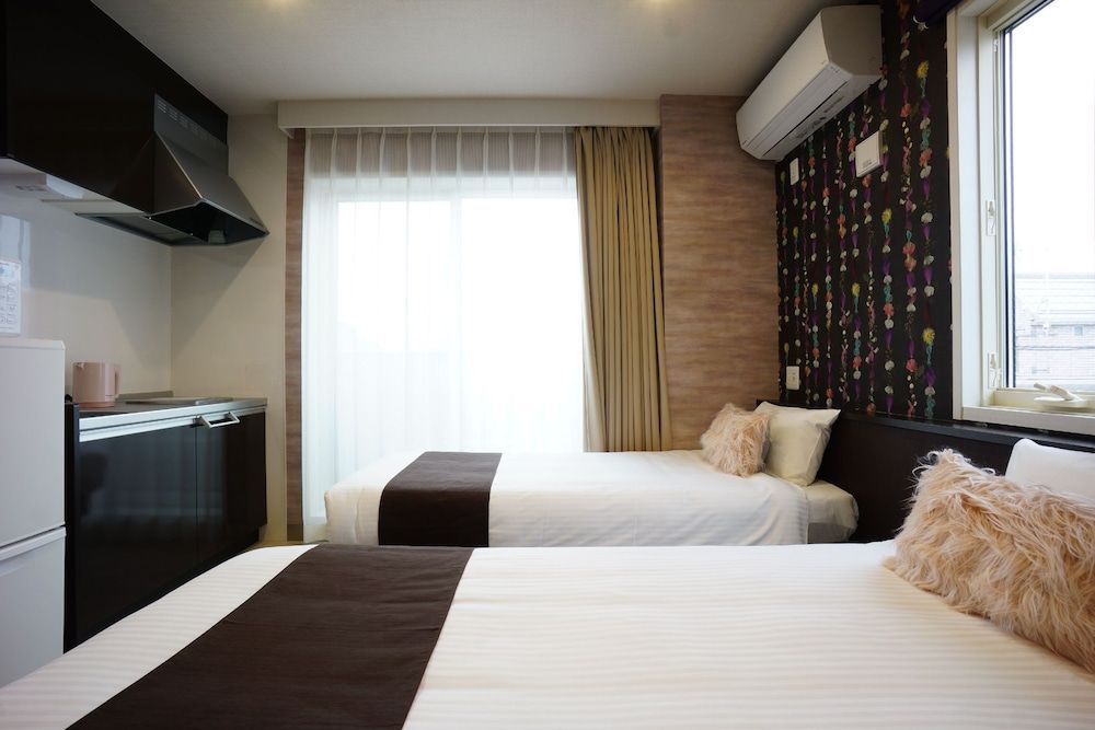 The South Hotel Tokyo Superior Quadruple Room 5