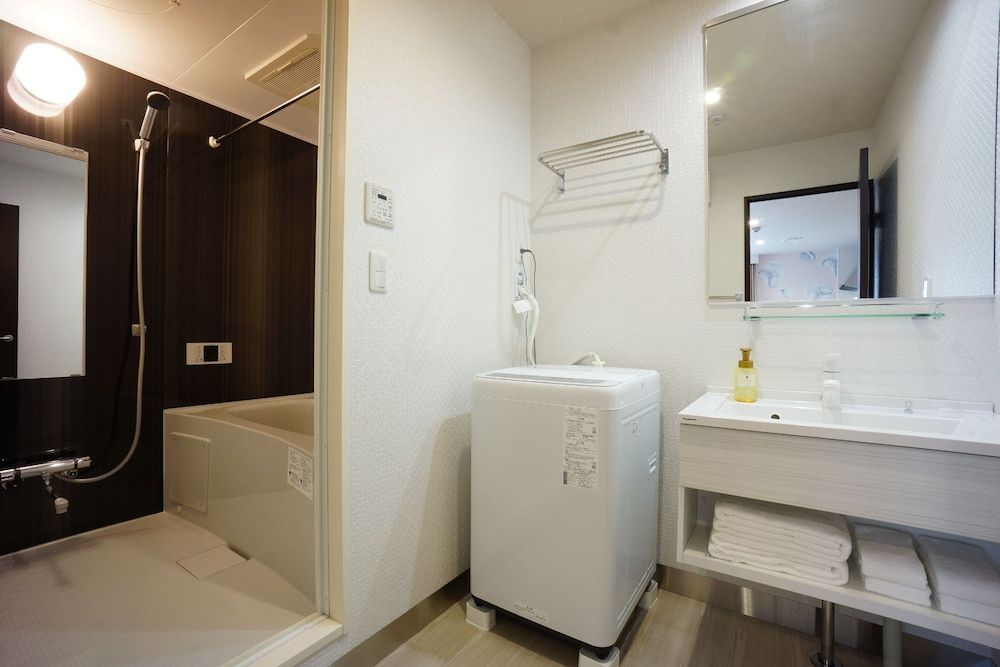 The South Hotel Tokyo Deluxe Triple Room 6