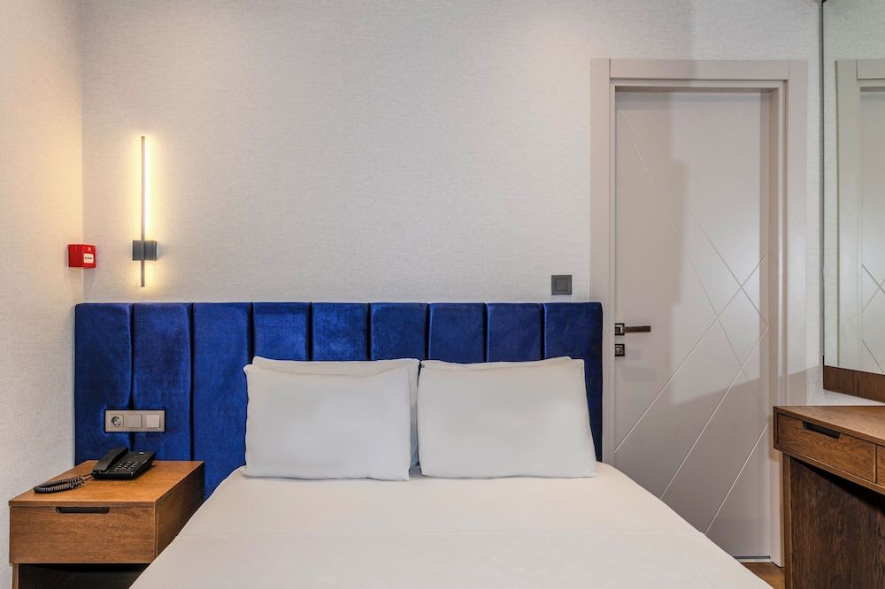 undefined Porta Romanos Hotel 5