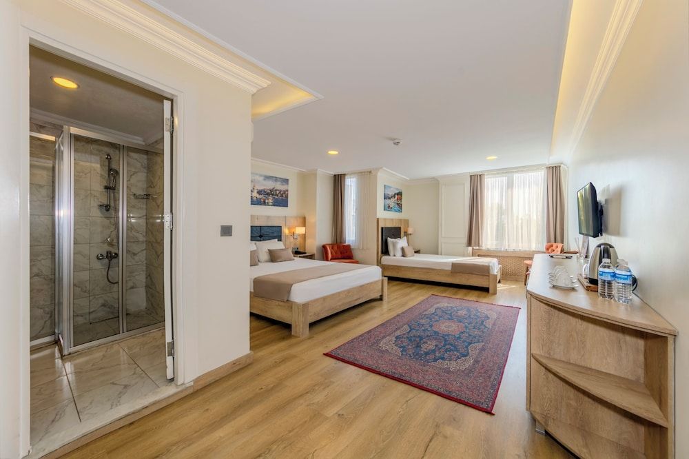 Porta Romanos Hotel Standard Triple Room