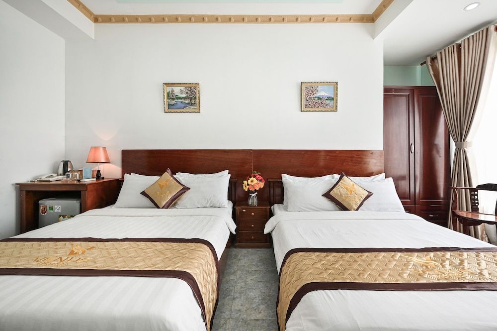 Venus Hotel Basic Quadruple Room 4