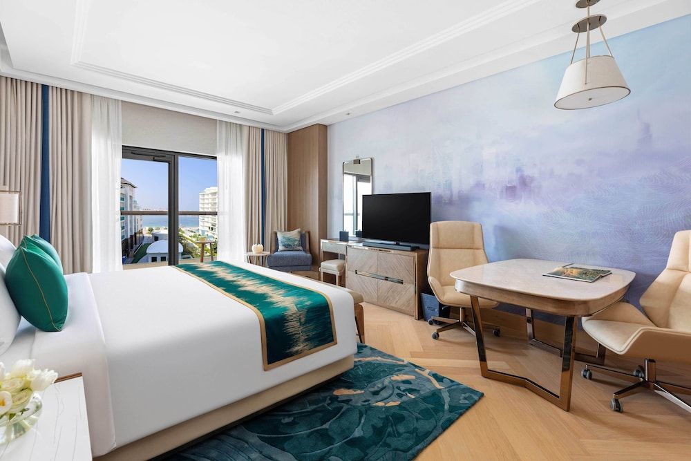 Luxury Suite Sea View King Bed with Sofa Bed and Club Lounge Access