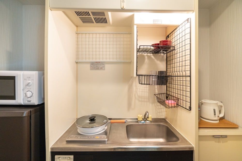 ZAITO Tokyo Kinshicho Economy Inn Signature Quadruple Room, Multiple Beds, Balcony, City View 7