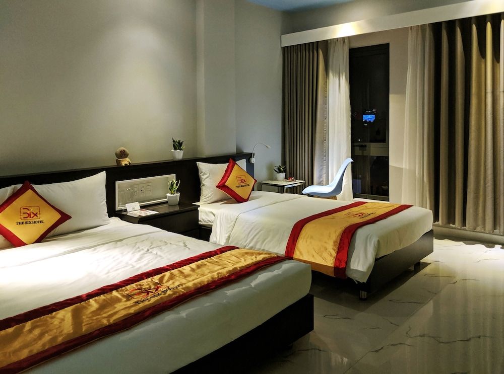 The Six Hotel Deluxe Triple Room, City View 11