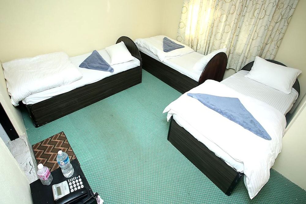 Mitra garden Inn Triple Room 4