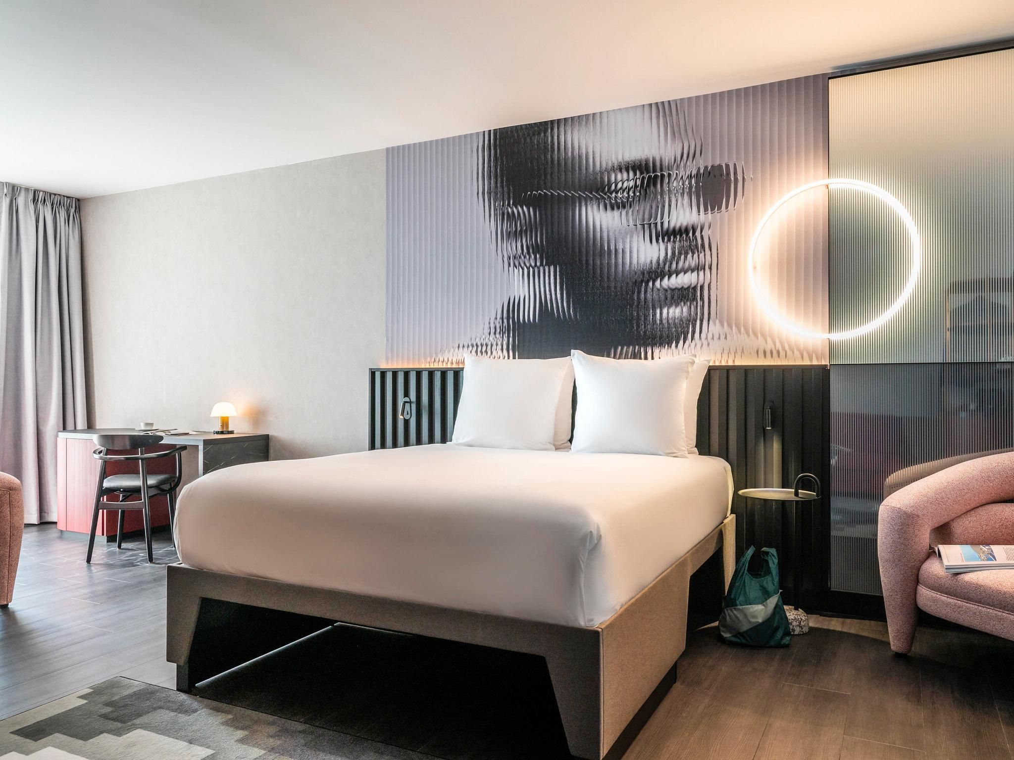 Deluxe Room with 1 queen bed and 2 single sofa beds