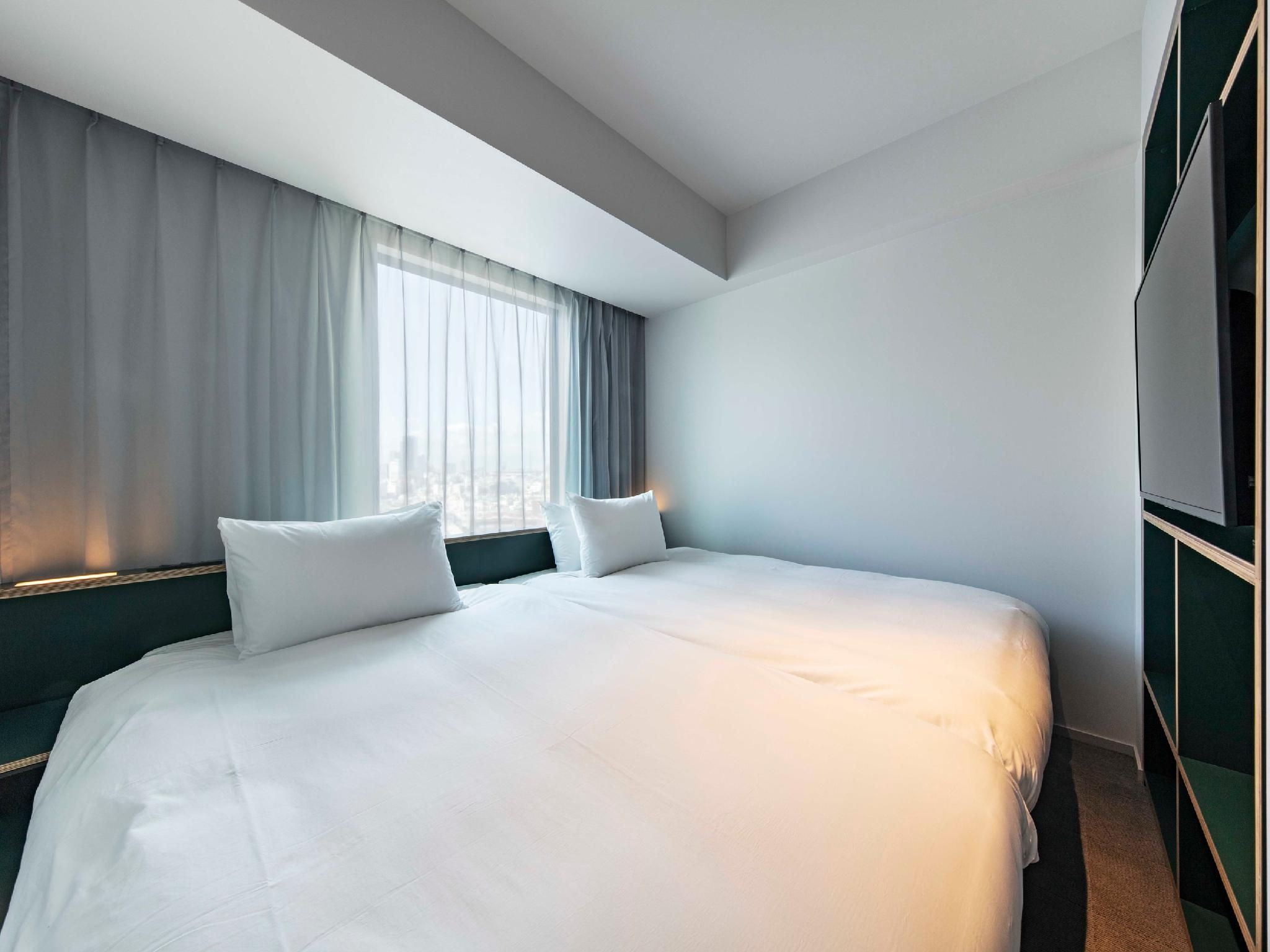 Medium Twin Room - Non-Smoking