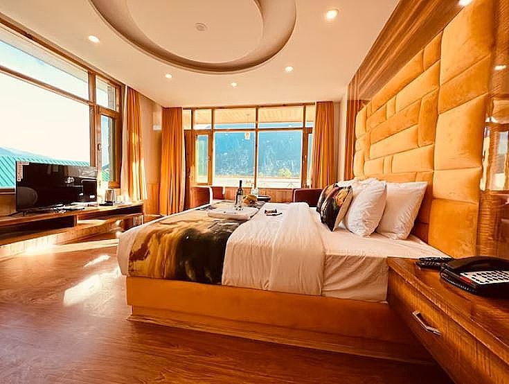 Family Room with balcony mountain view