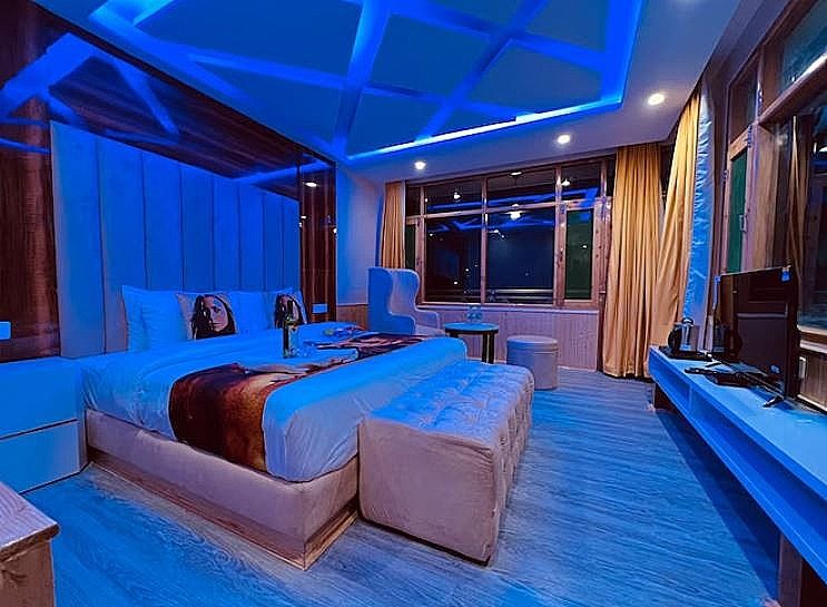 Family Room with balcony mountain view