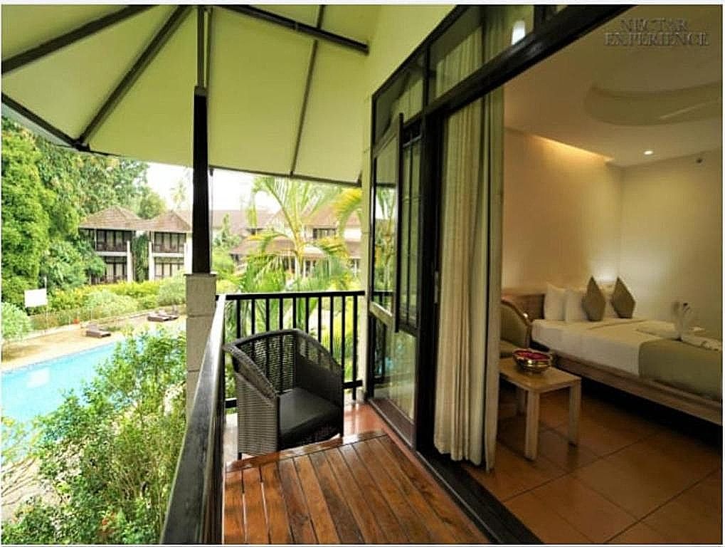 Whispering Waters Deluxe Garden View with Balcony 4