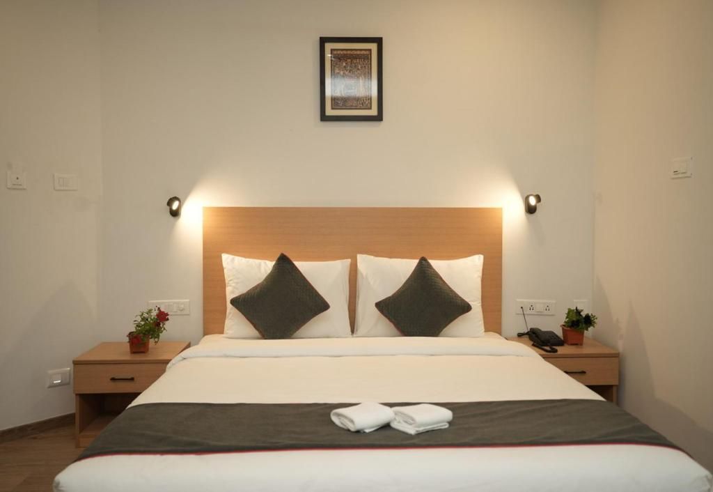GRAND GANPAT Deluxe Room