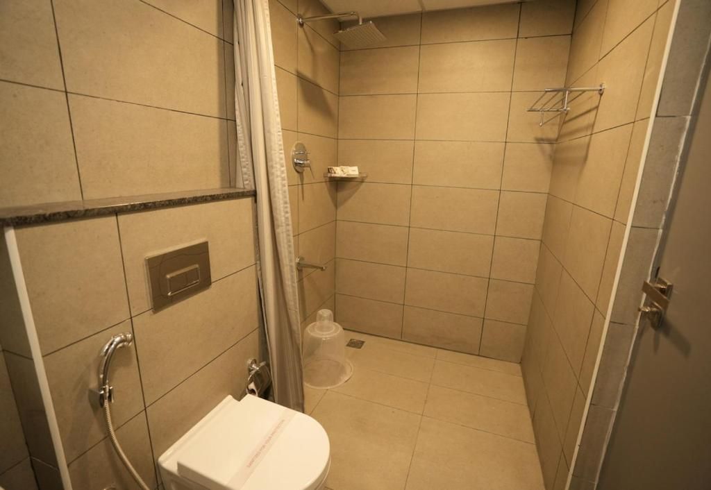 GRAND GANPAT Deluxe Room 4