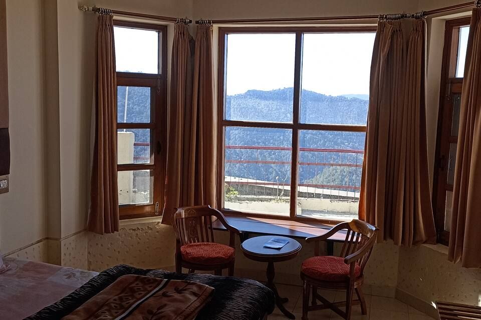 Deluxe Room - With Partial Valley View