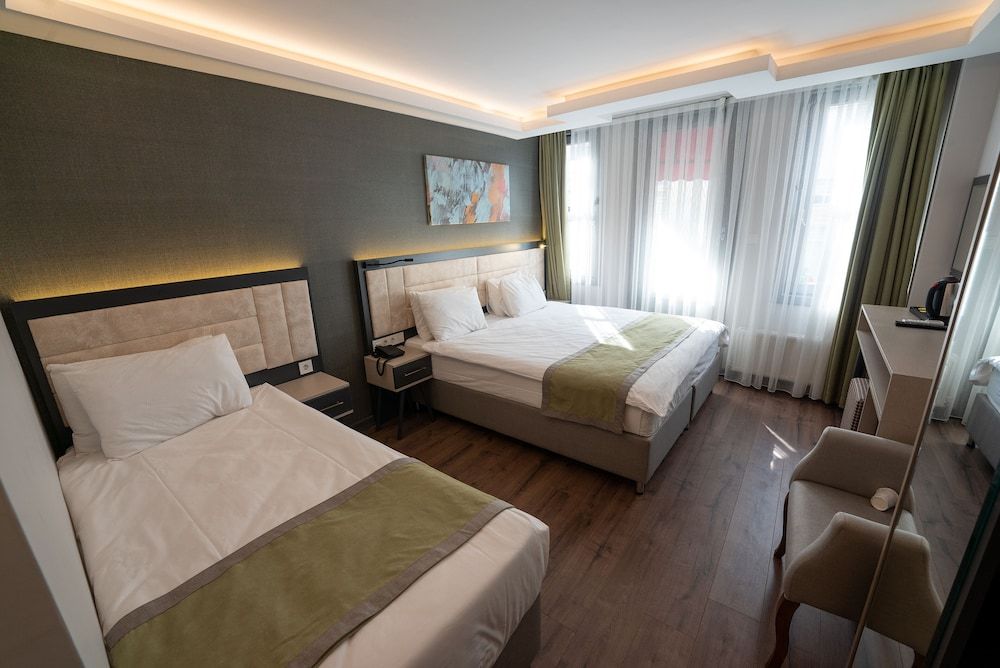 Deluxe Triple Room