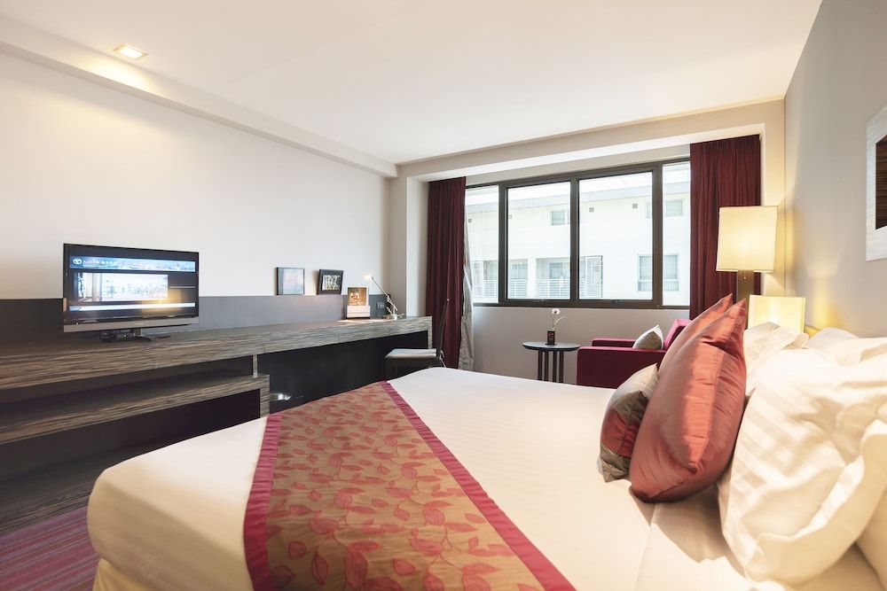 undefined Maroon Infinity Residence by Favstay 5