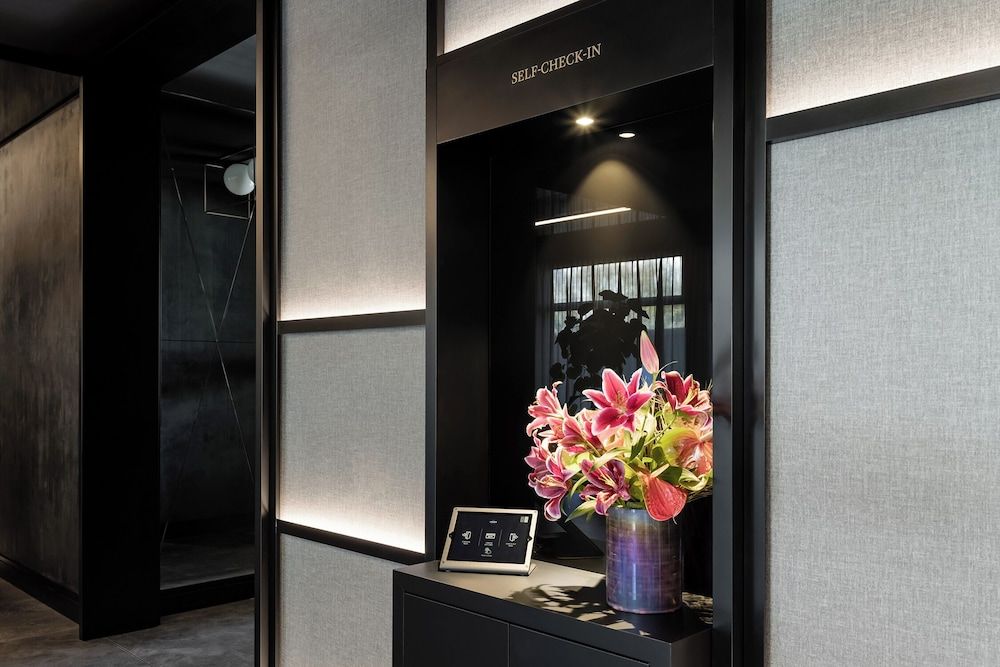 Check-in/check-out kiosk