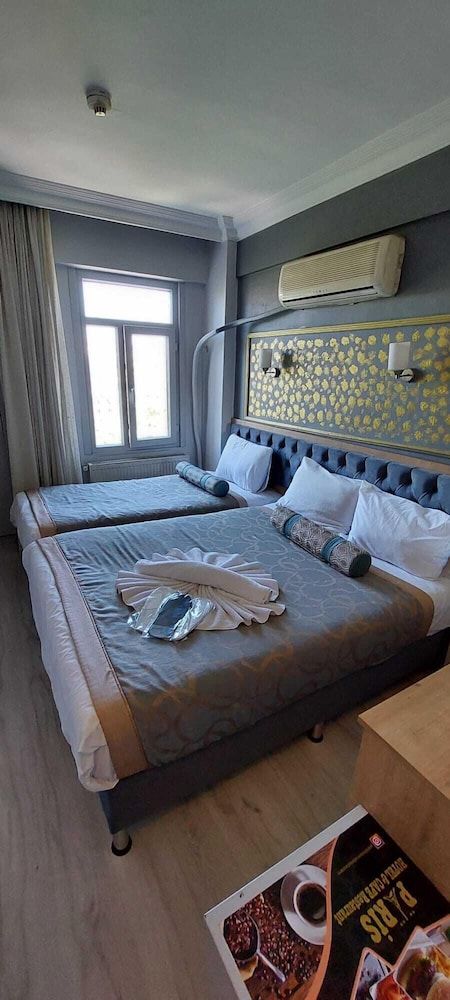 Paris Hotel Cafe Restaurant Economy Triple Room 2