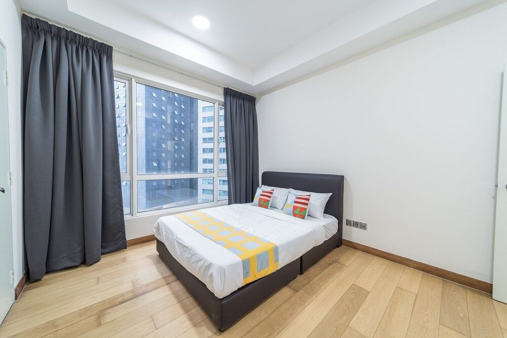 OYO Home 89449 Fancy 2 Bedroom Crest Residence Classic Room 4