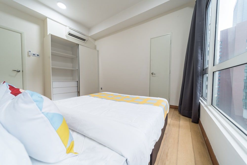 OYO Home 89449 Fancy 2 Bedroom Crest Residence Classic Room 3