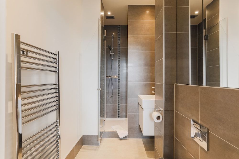 Monument by Excel Apartments Executive Apartment 13