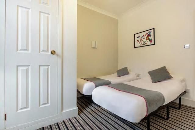 Enrico Hotel Standard Twin Room with Shared Bathroom