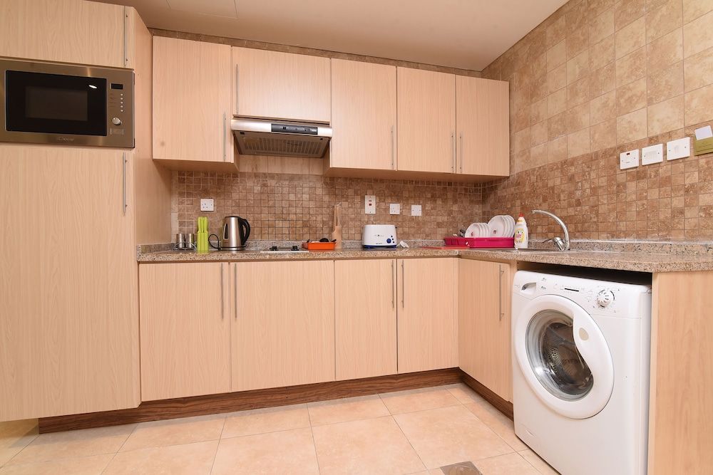 OYO Home 2351BHK Capitol Tower DIC Apartment, 1 Bedroom 22