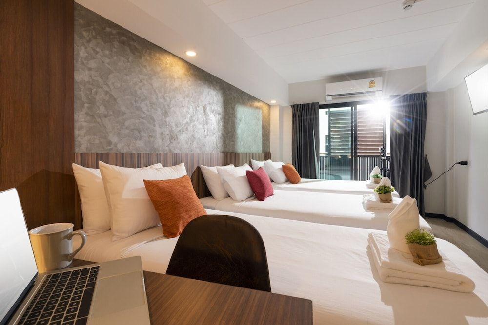 The Home Hotel Triple Room