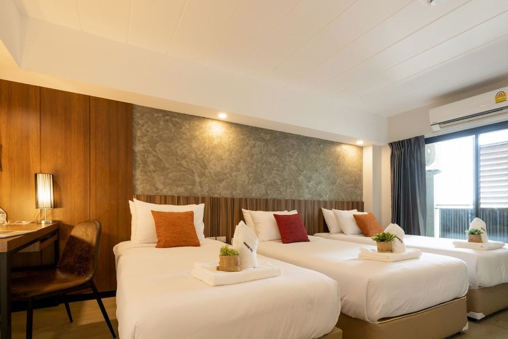 The Home Hotel Triple Room 2