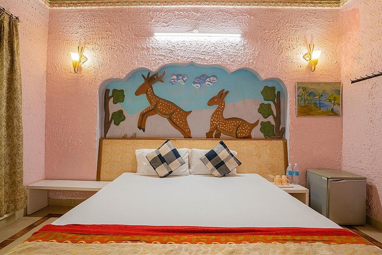 Singhana Haveli by Dhola Ri Dhani  Singhana Haveli Deluxe Room King Size Bed 2