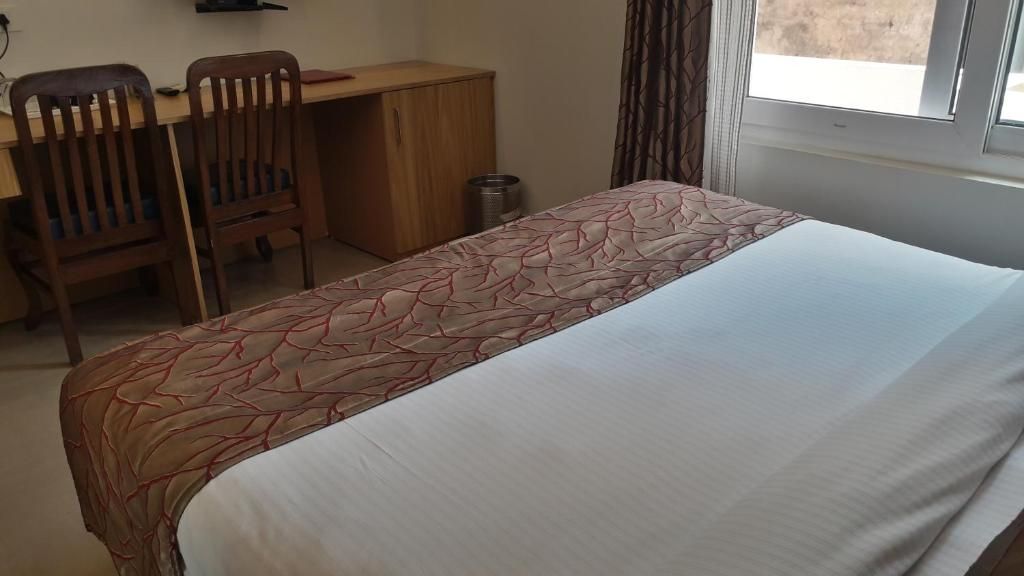 Hotel Guru Surbhi Deluxe Room 2