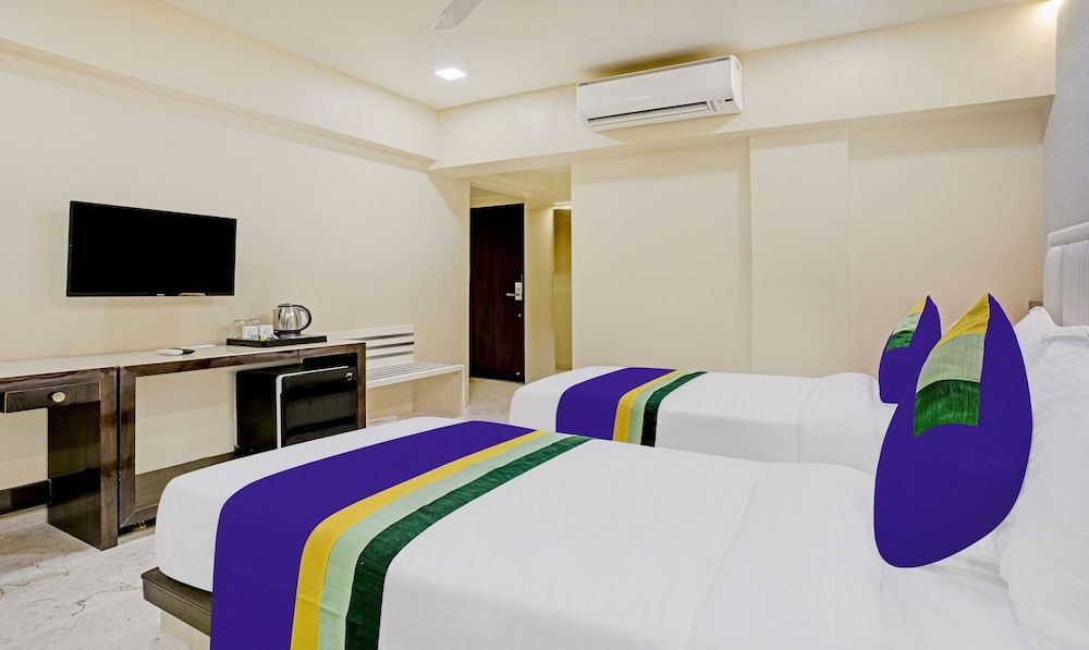 Treebo Premium Golden Bliss Trimurti Nagar Square Standard Double Room 7