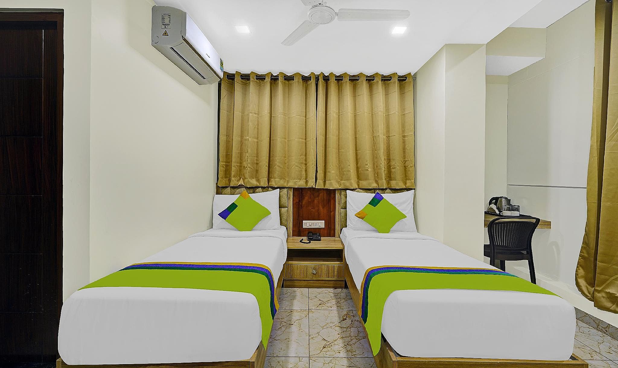 Treebo Elmas Grand Standard Double Room 6