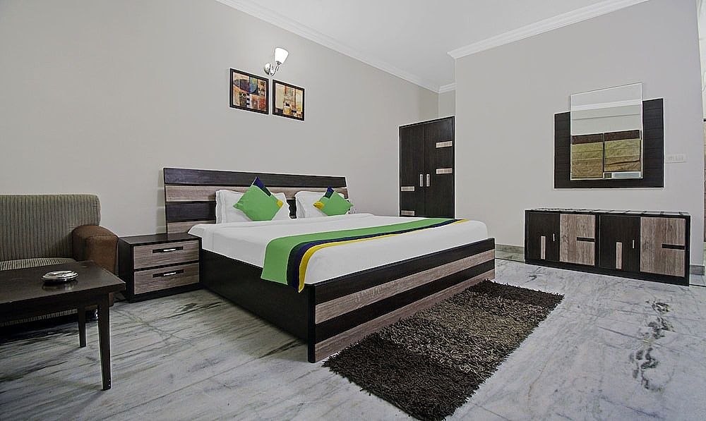 Treebo Maharaja Residency Standard Double Room 6