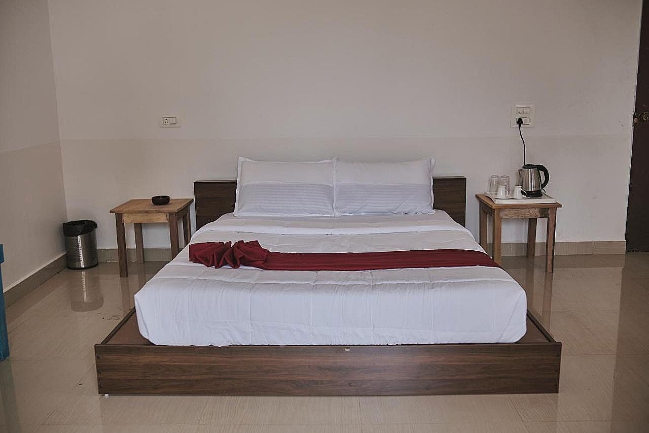 Woodpegger By The Beach Classic Room with Sit-out 3