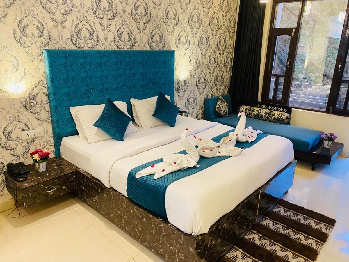 Natures feast Deluxe Room With Private Balcony 3