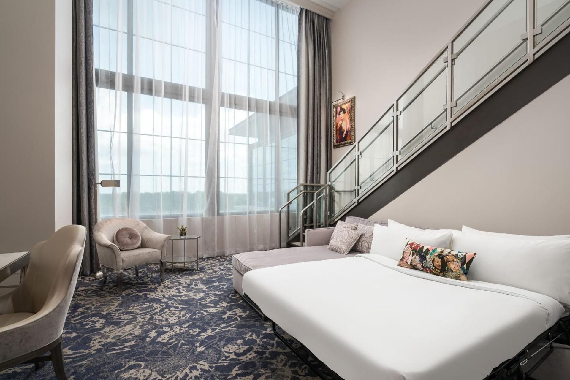 One-Bedroom Bi-Level King Loft with Sofa Bed