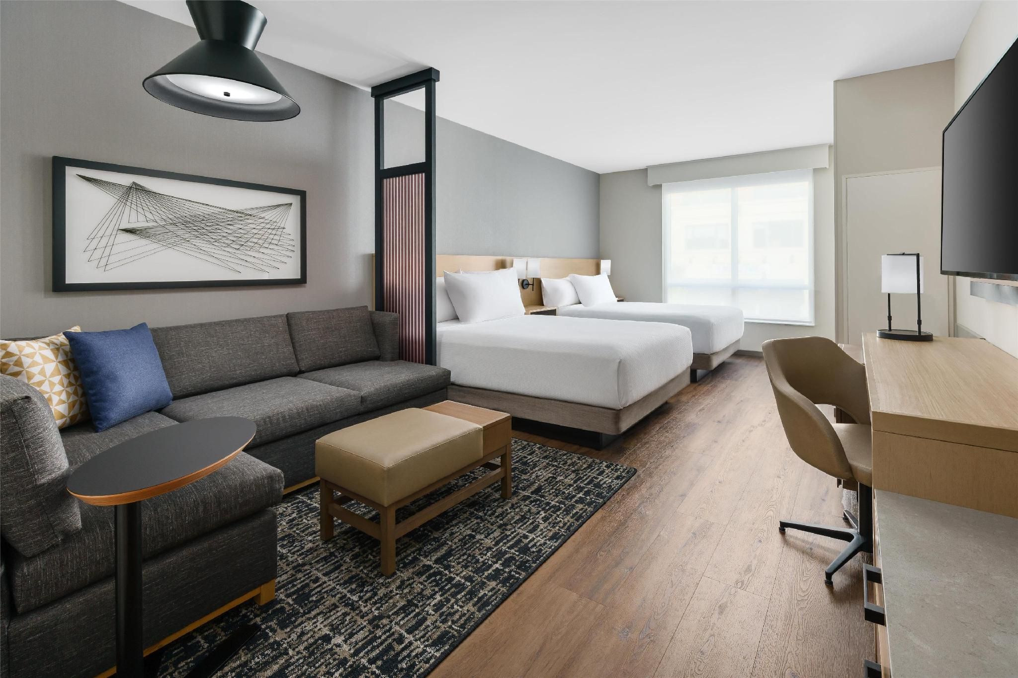 Accessible Two Queen Beds Rollin Shower (Plus Sofa Bed)